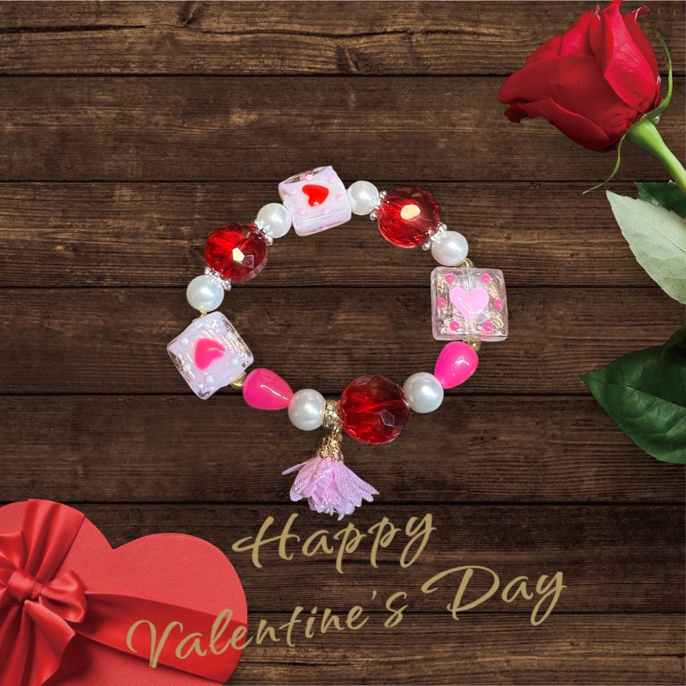 Heart Charm Bracelet with Red and Pink Accents
Great birthday gift